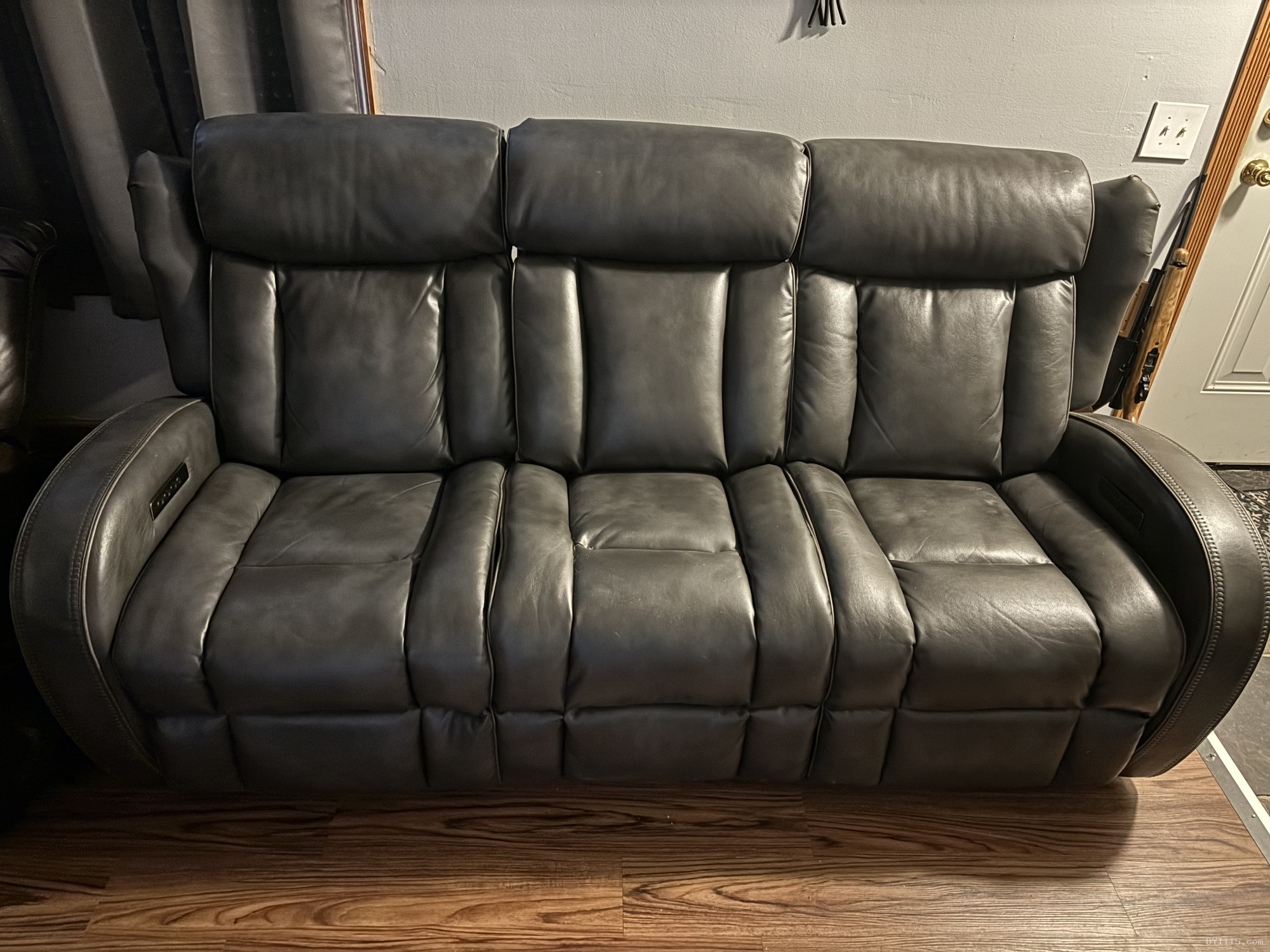 Black leather reclining couch